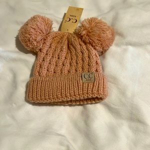 New with tags, light pink infant beanie